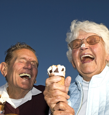 Elderly couple happy eating ice cream - Access 21 Interiors Southampton